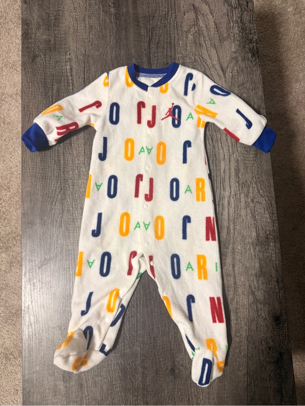 Jordan White Multicolor Letter Logo Footed One-Piece